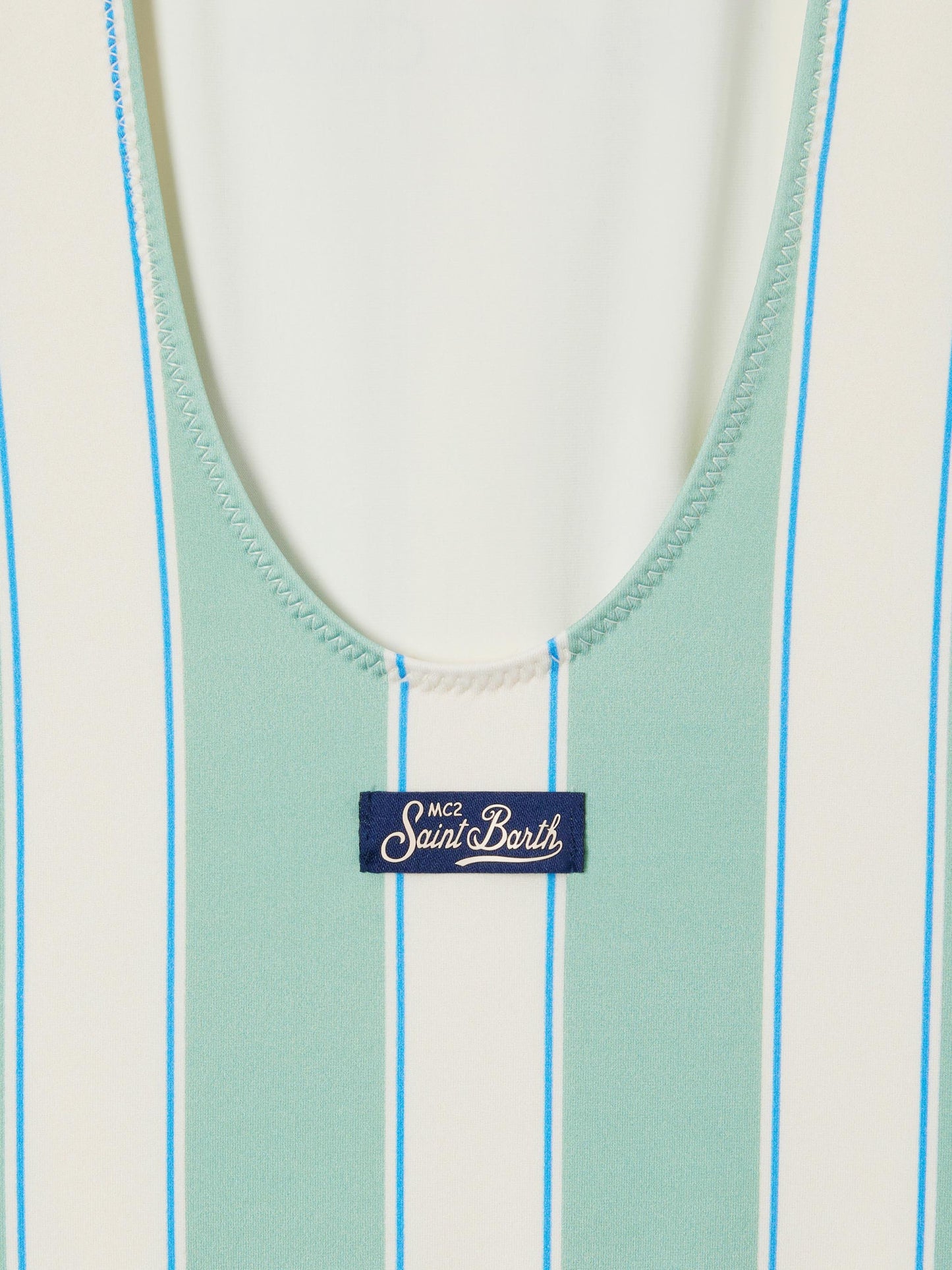 Cara green and white striped one-piece swimsuit with Beach Club print