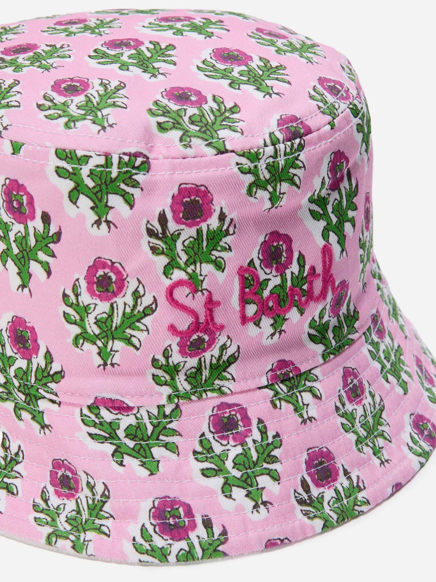Reversible bucket hat in boho floral print and white terry cloth