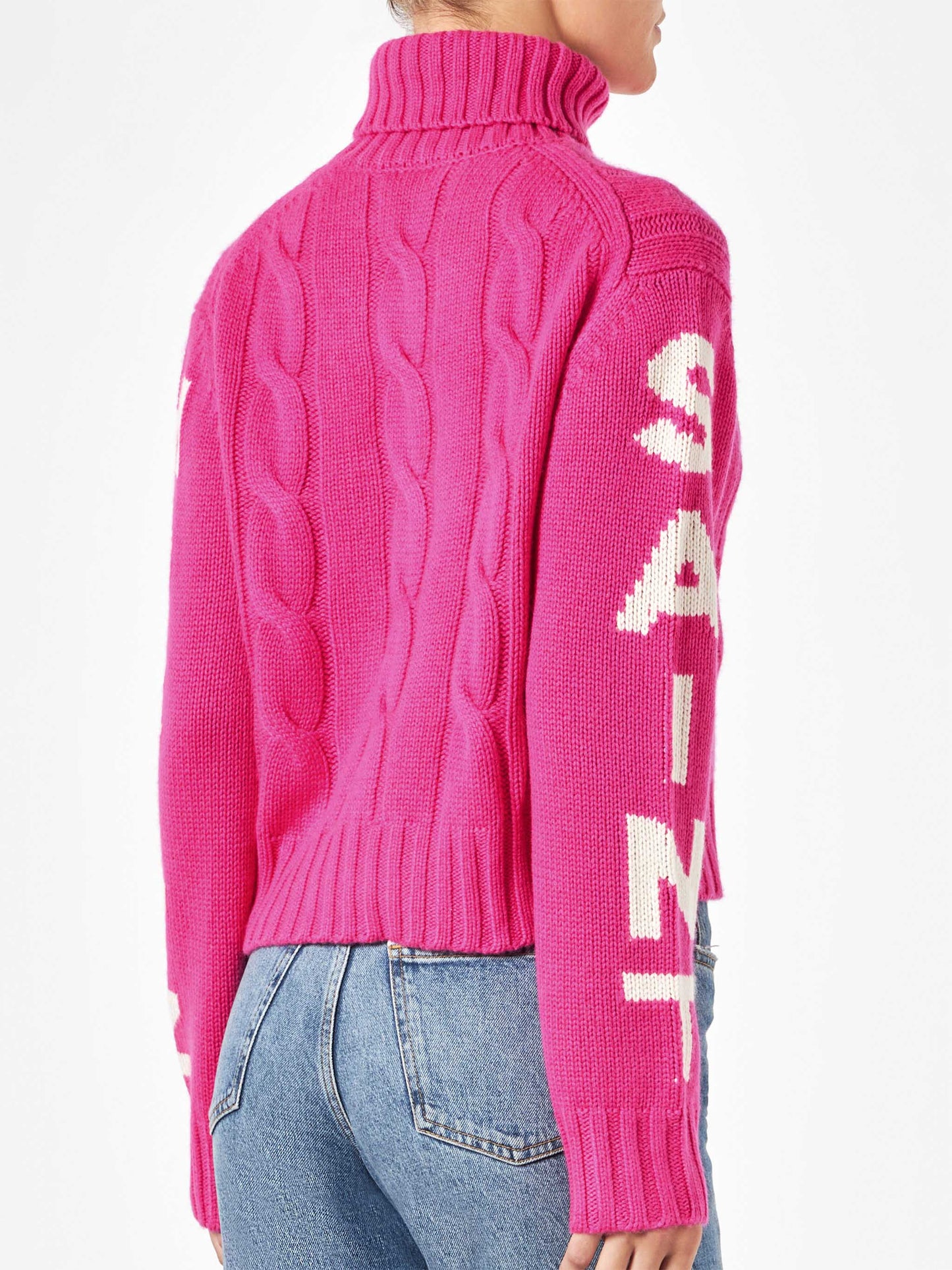 Woman fluo pink turtleneck braided sweater