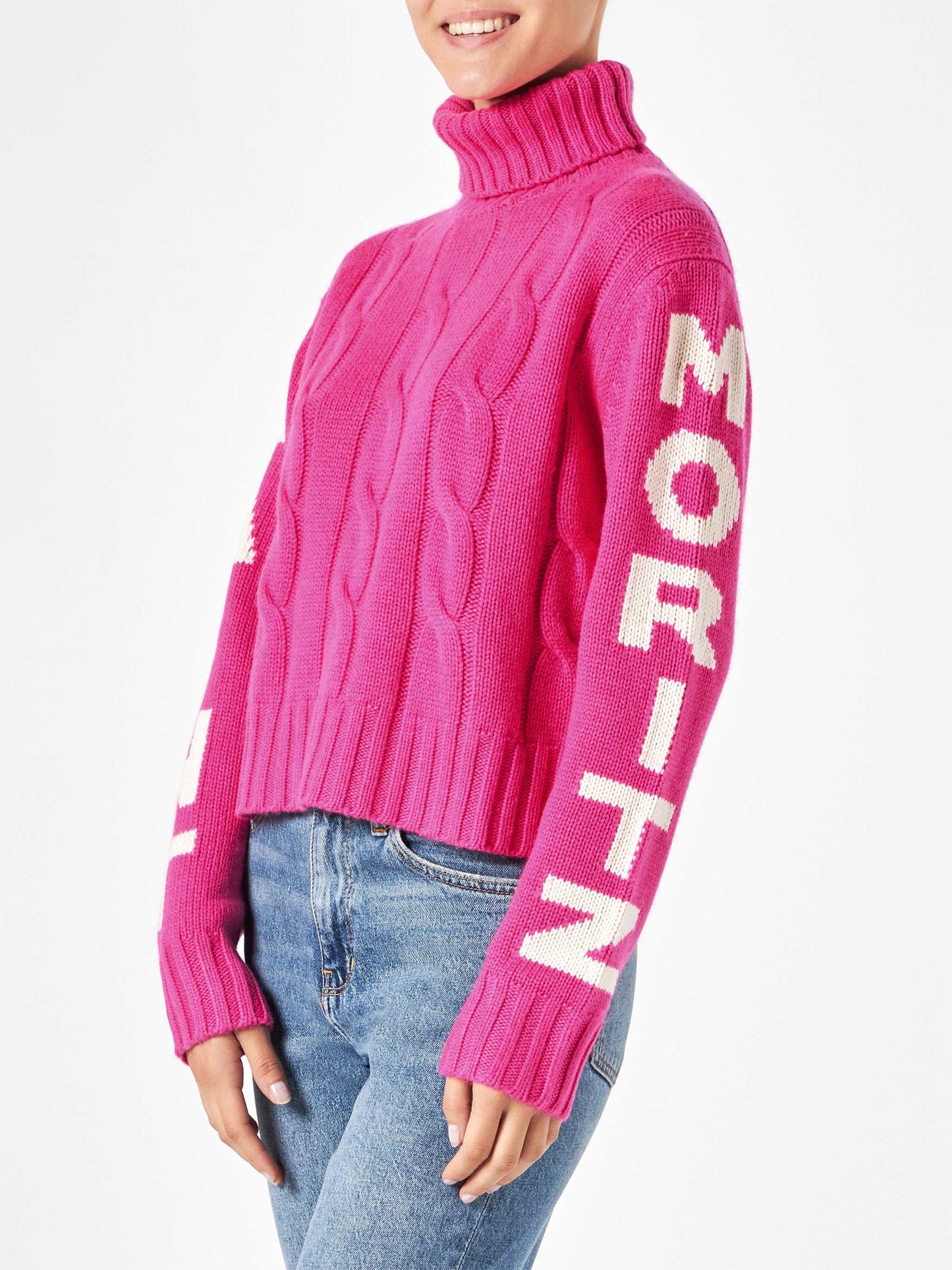 Woman fluo pink turtleneck braided sweater