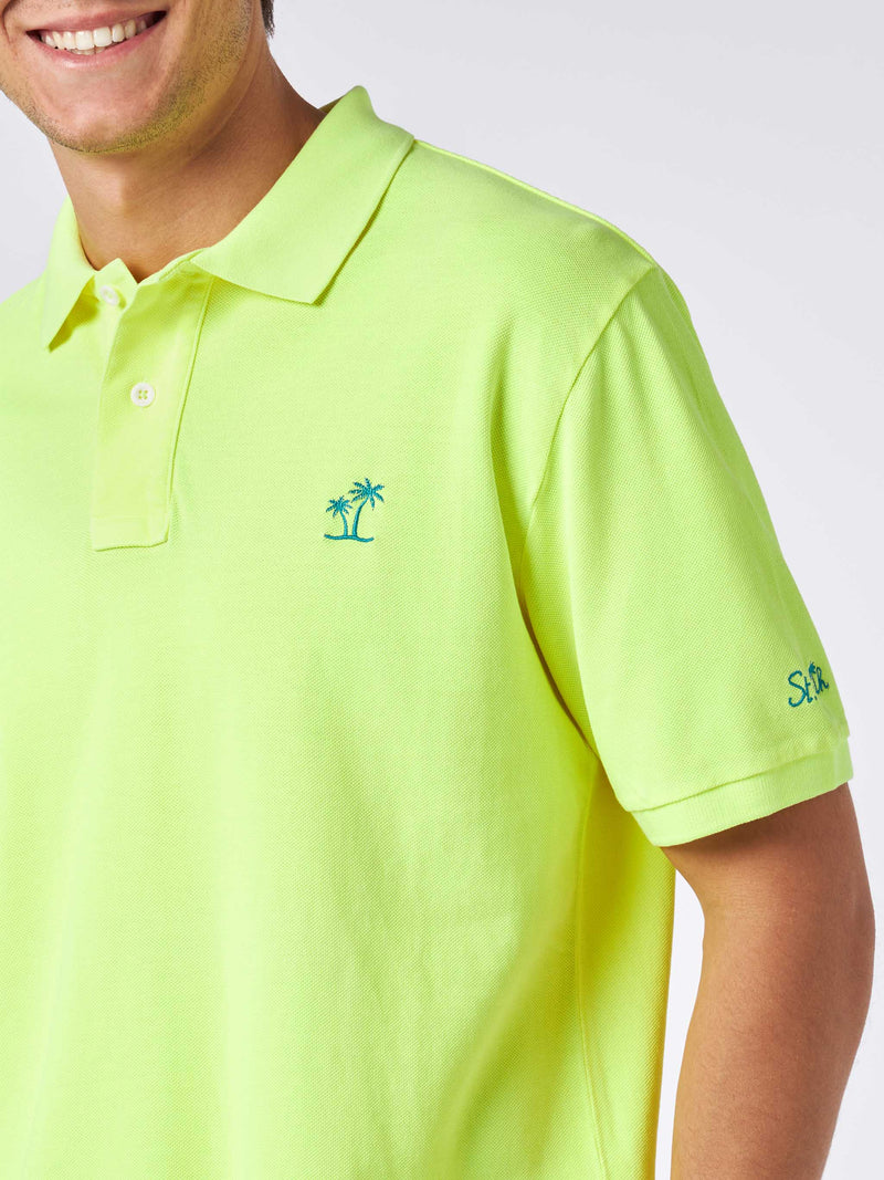 Herren-Poloshirt aus fluogelbem Piquet mit St. Barth-Logo und Vintage-Effekt