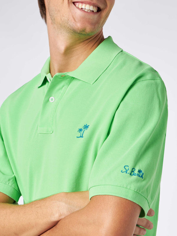 Polo da uomo in piquet verde fluo con logo St. Barth ed effetto vintage