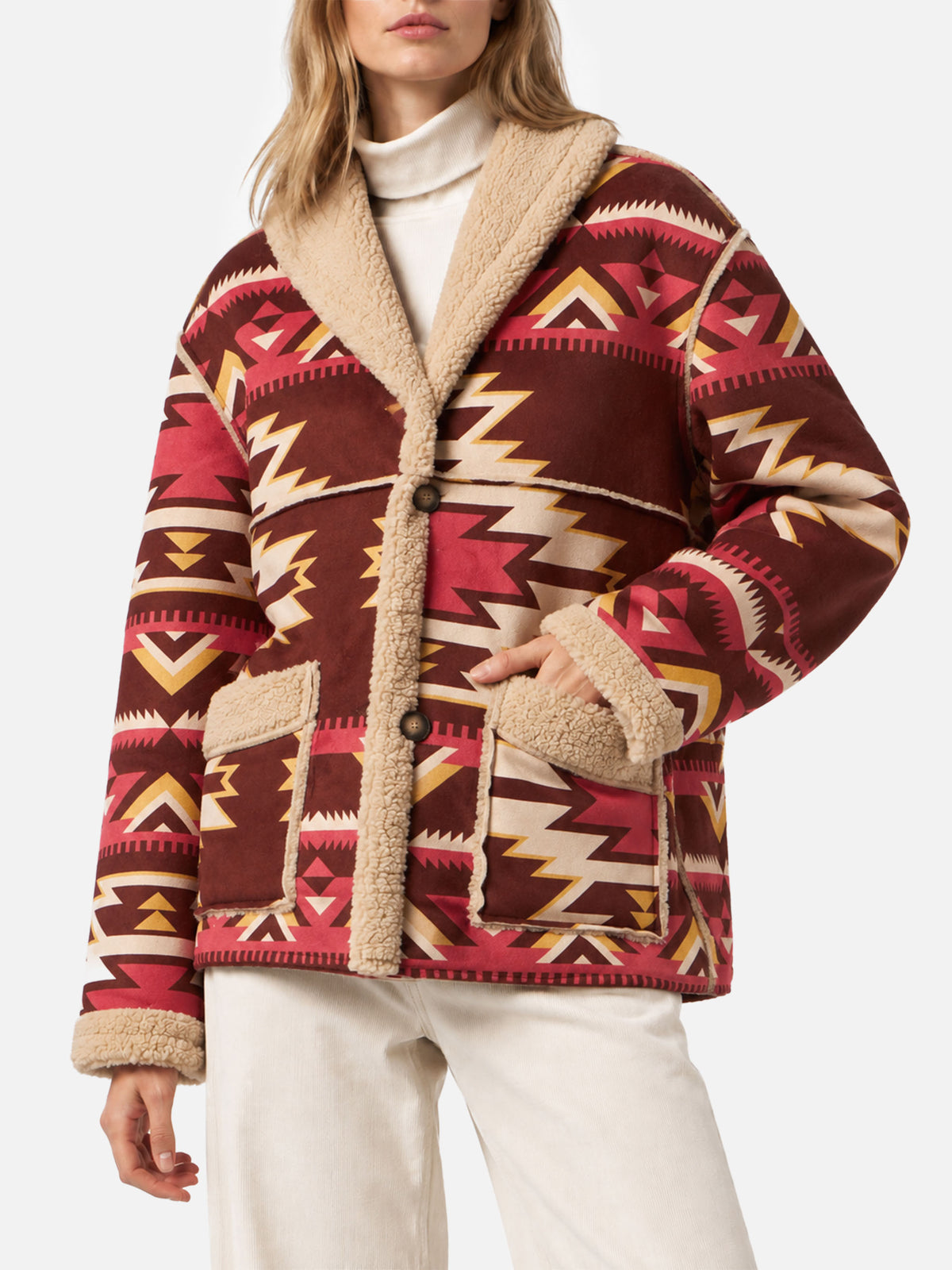 Beige Dorys reversible shearling coat with ethnic pattern