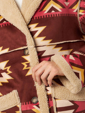 Beige Dorys reversible shearling coat with ethnic pattern