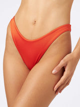 Shiny orange swim briefs