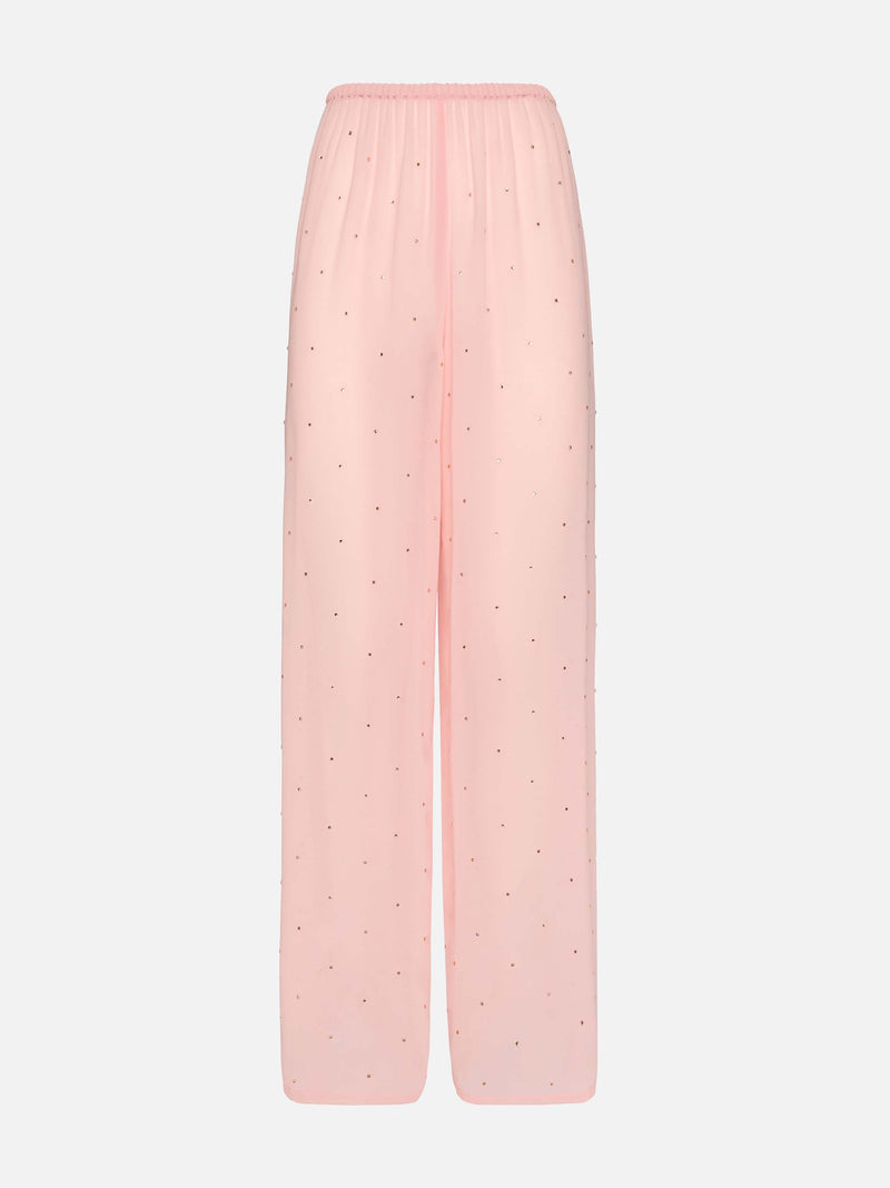 Pantaloni ampi Amalia in georgette rosa con strass