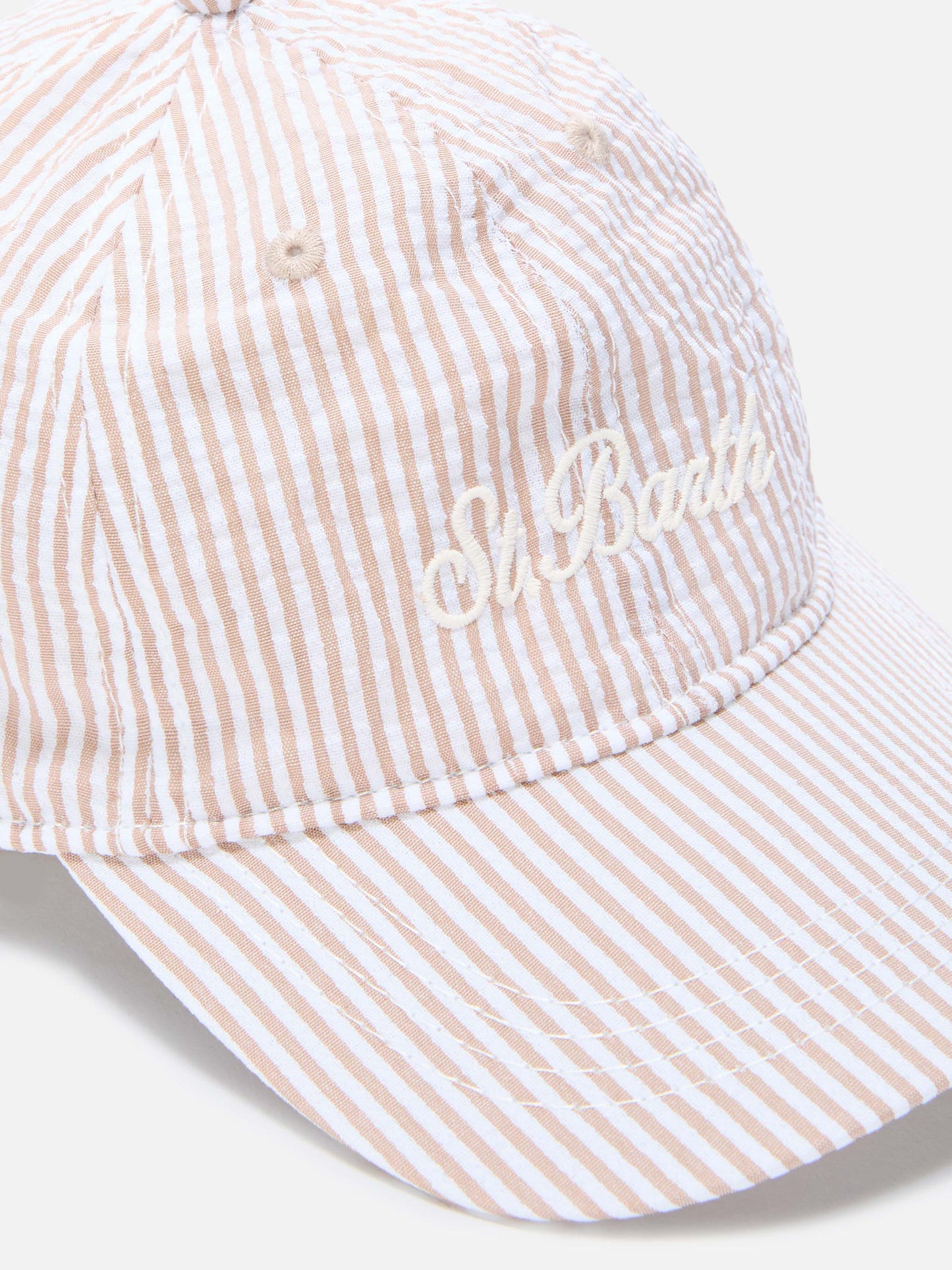 Baseball cap with visor in cotton seersucker with beige and white stripes