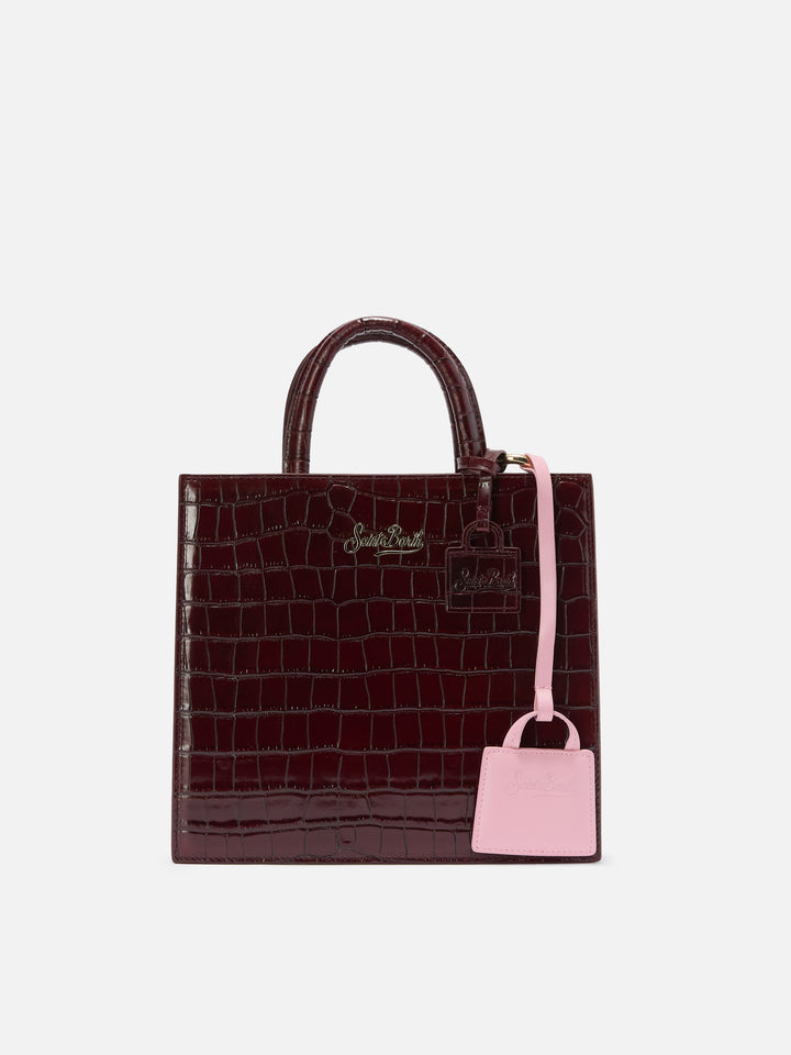 Bag charm in pelle liscia rosa chiaro con logo impresso