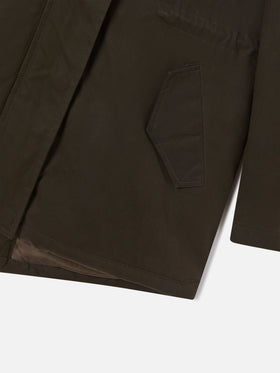 Parka Brenna verde militare in tessuto cerato con cappuccio in effetto pelliccia