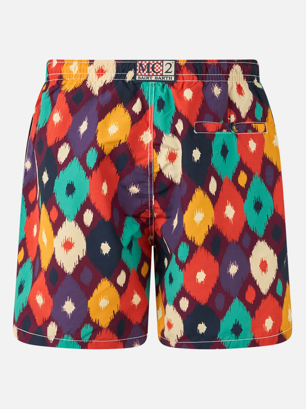 Mittellange mehrfarbige Ikat-Badeshorts für Herren Caprese