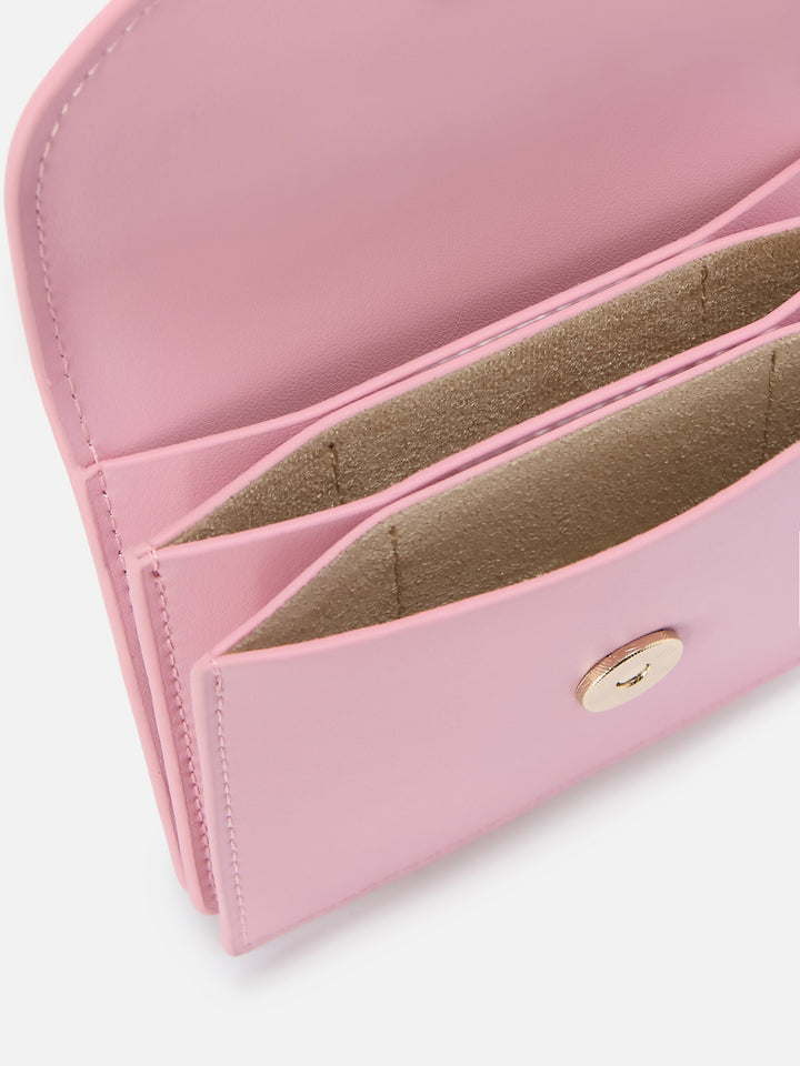 Light pink smooth leather card holder with metal logo