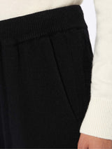 Woman knitted black jogger pants