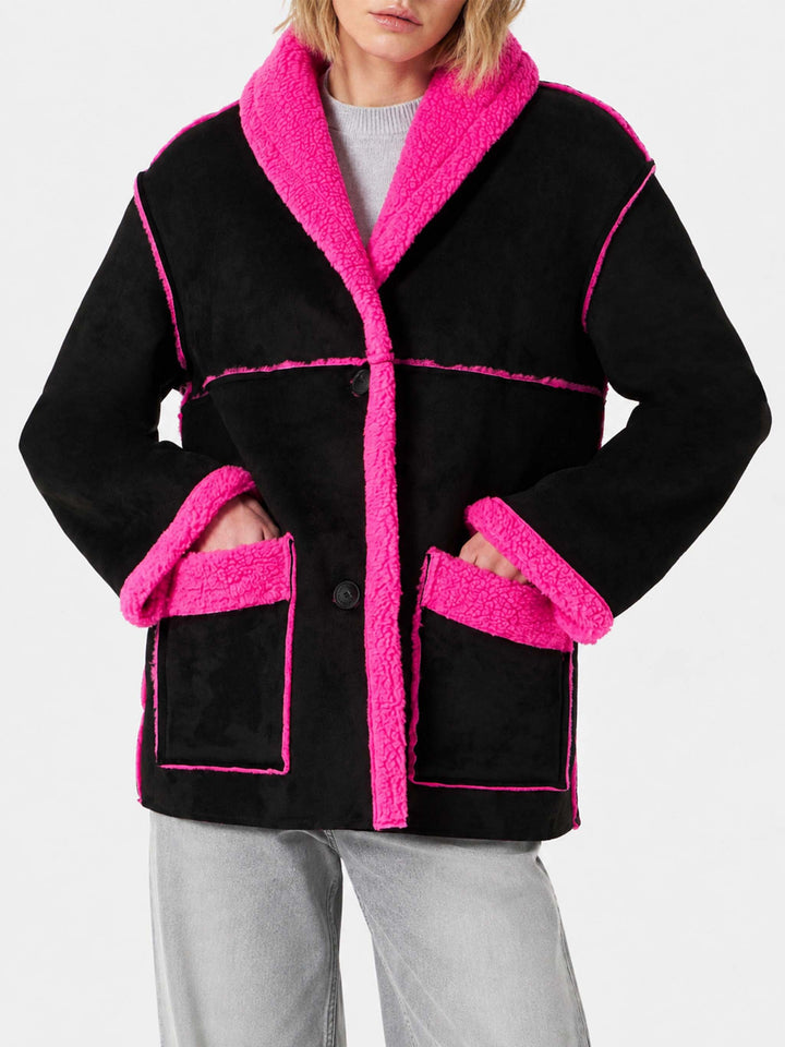 Black and fluo pink Dorys reversible shearling coat