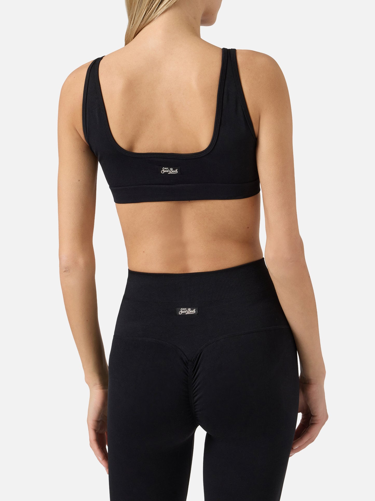 Top sportivo Fify nero in tessuto tecnico elasticizzato