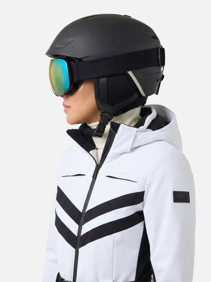 Woman white ski suit Garmisch with RECCO® technology