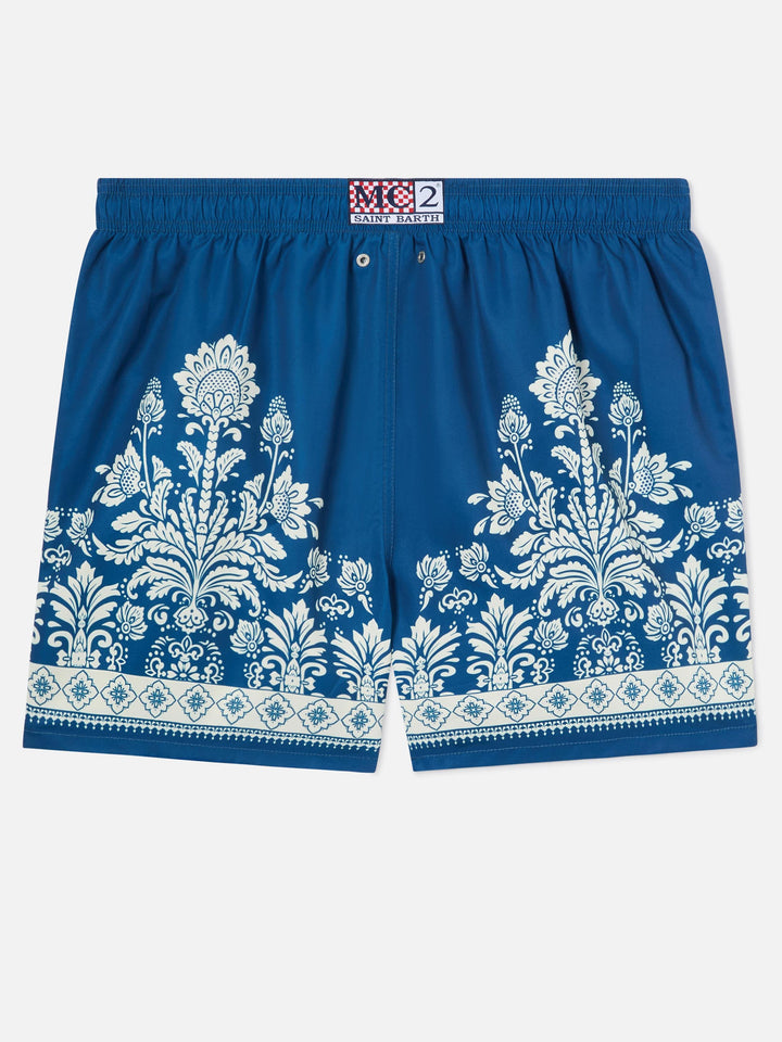 Bañador corto azul Gustavia con estampado floral ornamental 