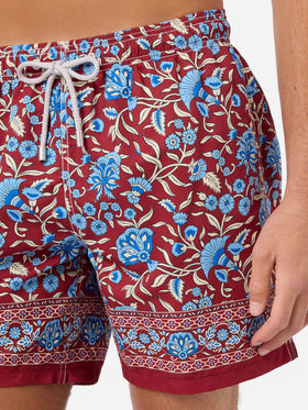 Gustavia bordeauxfarbene Badeshorts mit floralem Print 