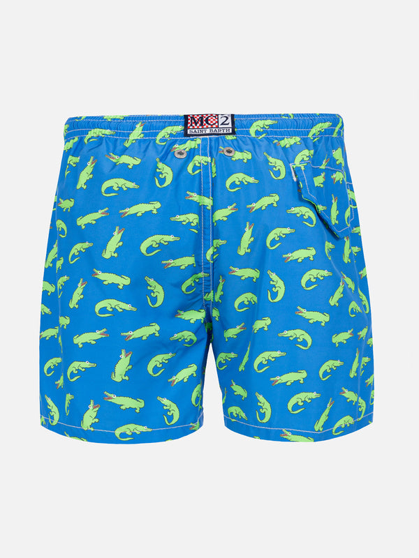 Blaue Badeshorts für Jungen mit grünem Alligatorprint