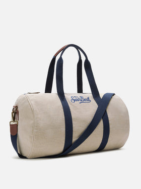 Round Jetleg beige linen weekender with contrasting embroidered logo