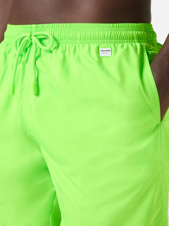 Lighting Pantone swim shorts in solid fluo green | Special Edition