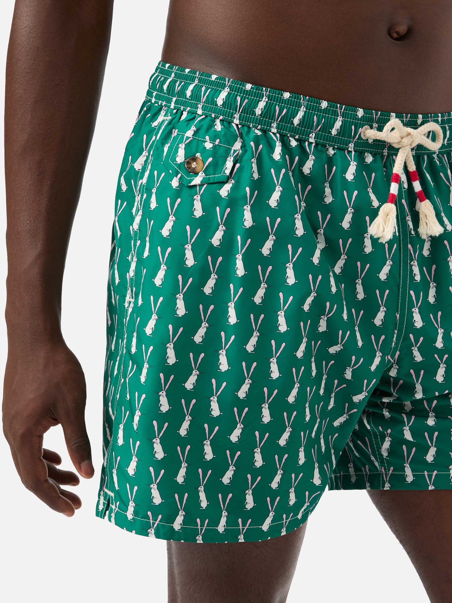 Lighting swim shorts in technical fabric with rabbit pattern in green and multicolor