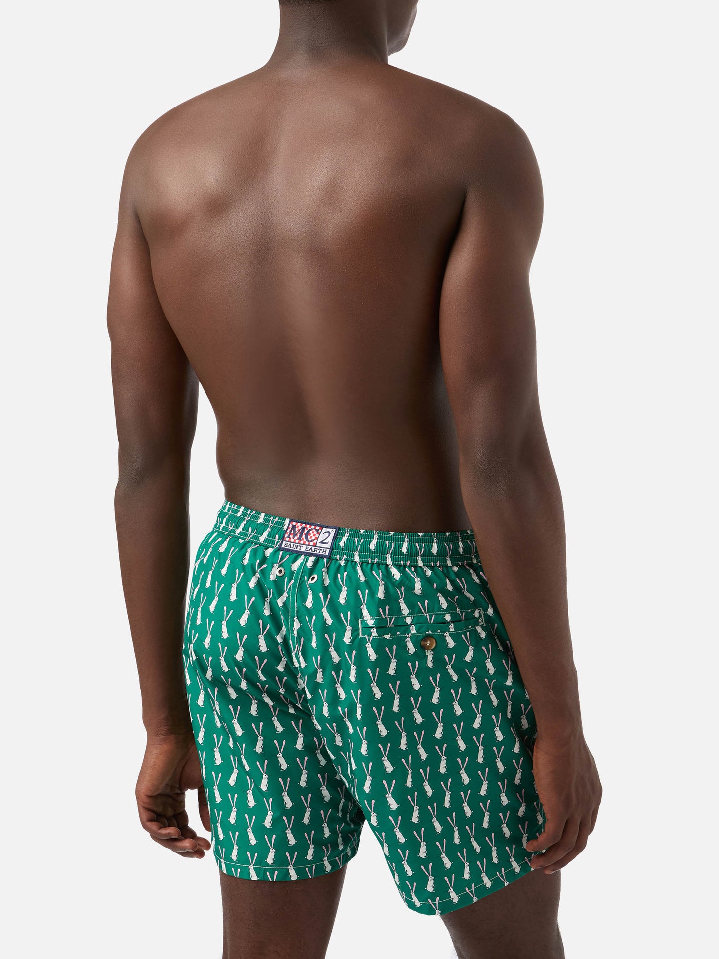 Lighting swim shorts in technical fabric with rabbit pattern in green and multicolor