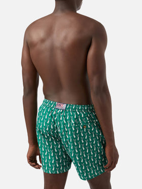 Lighting swim shorts in technical fabric with rabbit pattern in green and multicolor