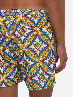 Man light fabric swim shorts with majolica print