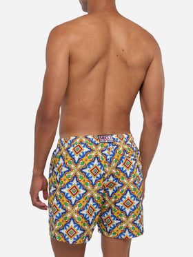 Man light fabric swim shorts with majolica print