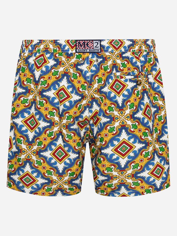 Man light fabric swim shorts with majolica print