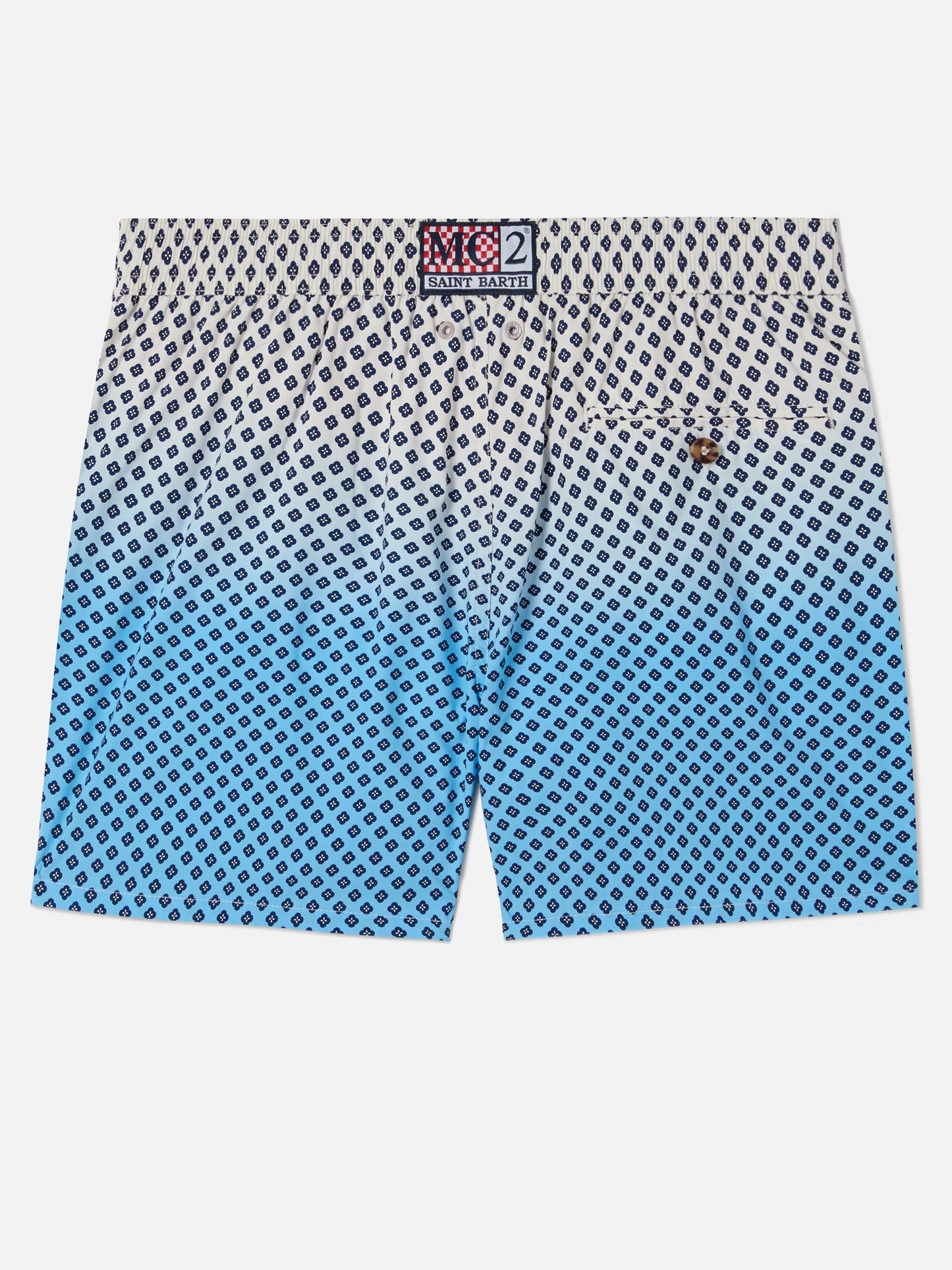 Lighting Micro swim shorts with geometric print on shaded background