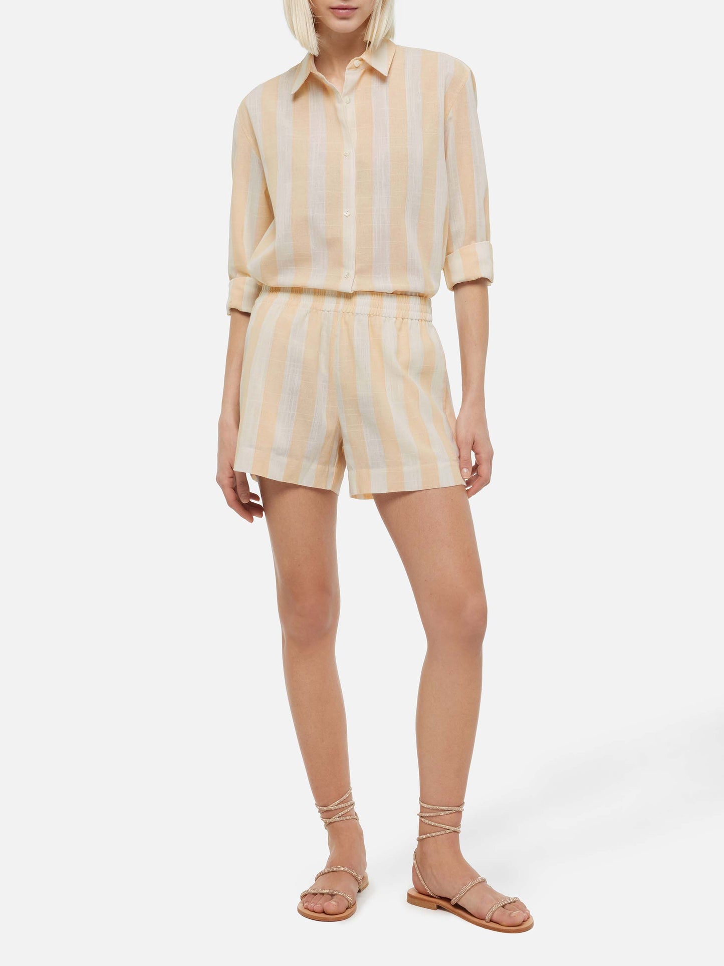 Meave shorts pull up in lino con stampa a righe beige
