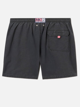 Patmos swim shorts in black with used effect and logo embroidery