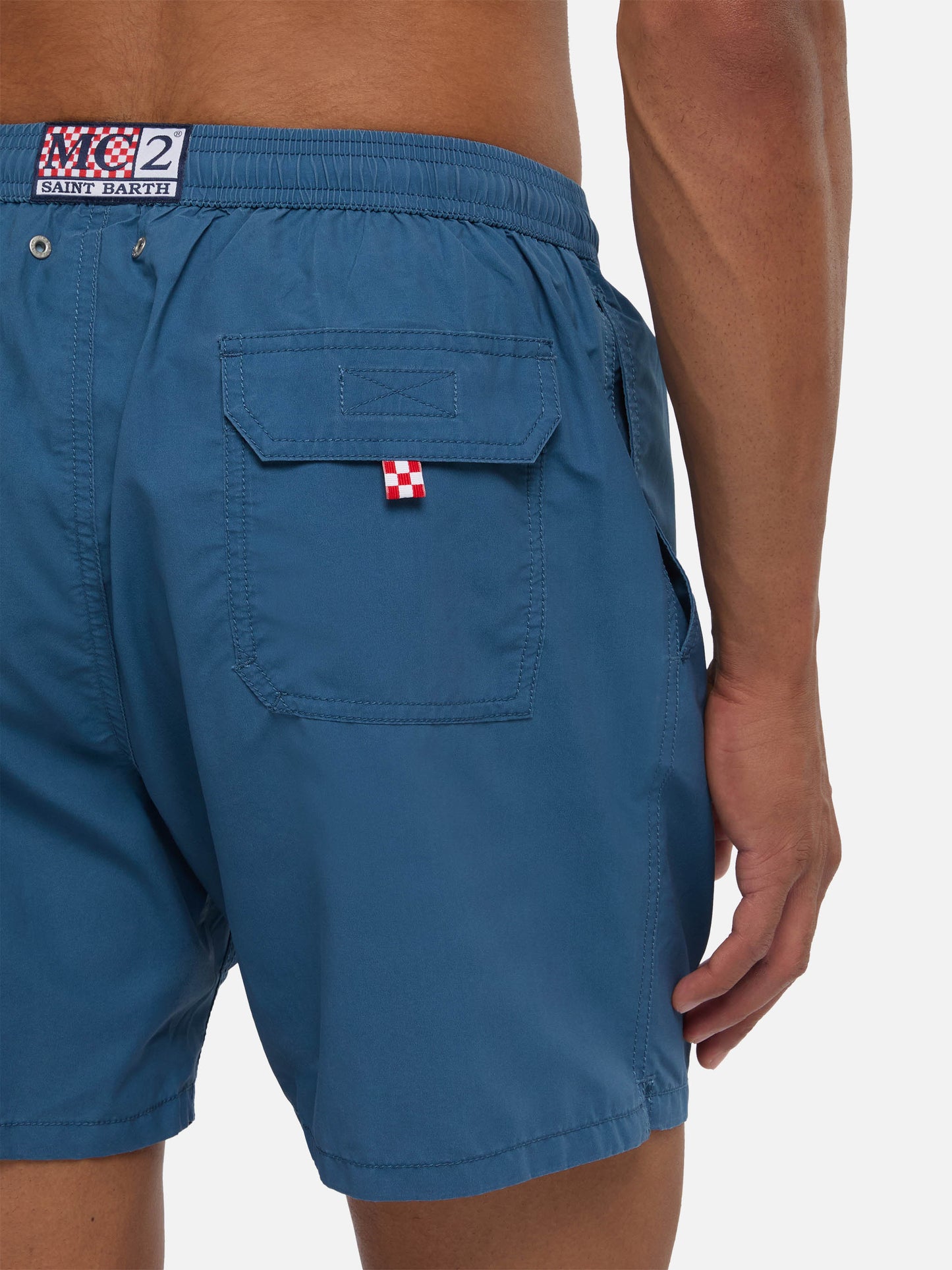 Bañador Patmos en azul marino blue con efecto desgastado y bordado del logo 