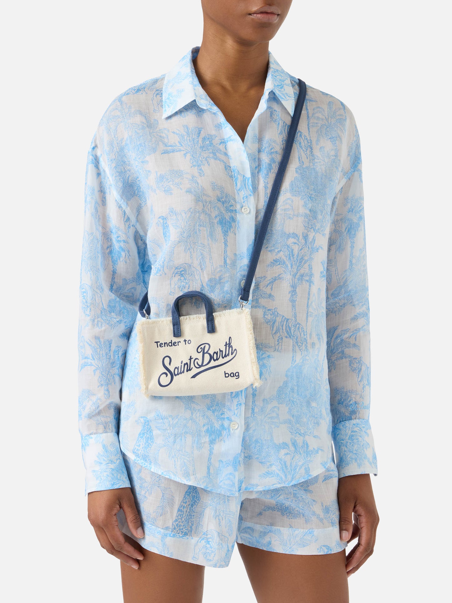 micro Phone canvas bag in white with blue details and contrasting logo