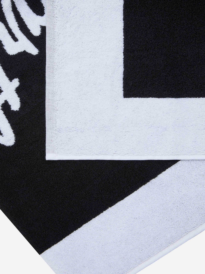 Black terry beach towel with white frame