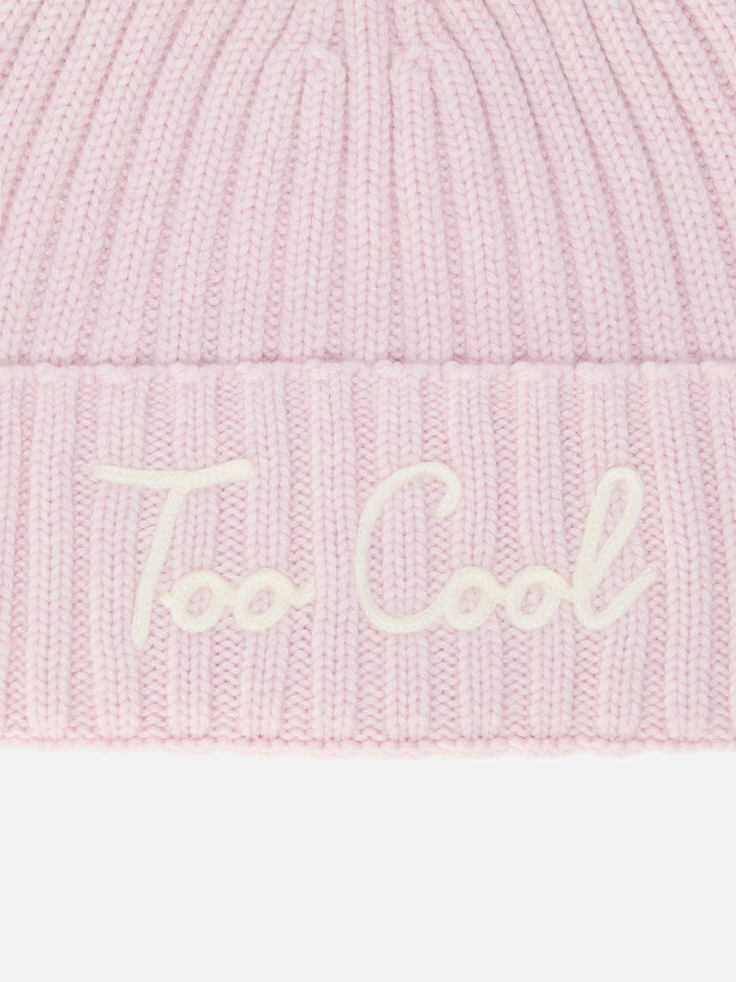 Wengen beanie in cashmere blend with pink “Too Cool” embroidery and pom-pom