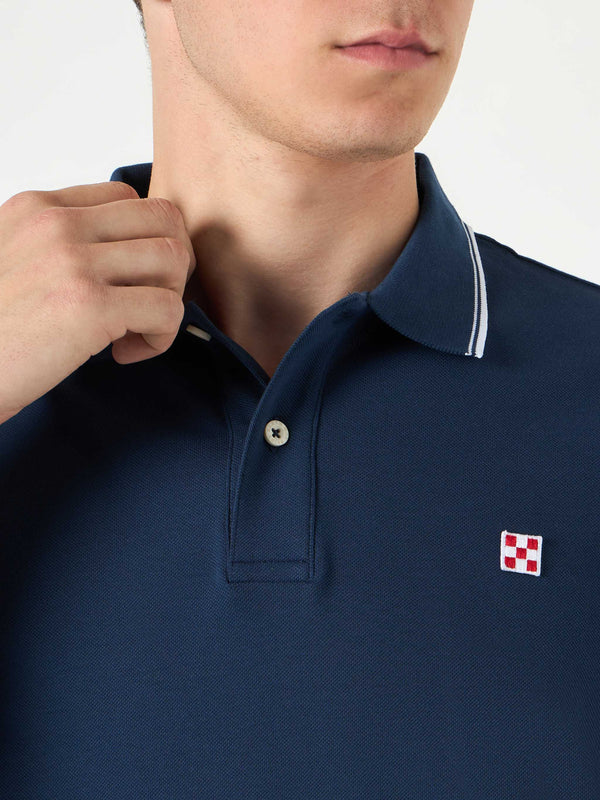 Blue navy piquet polo with St. Barth logo