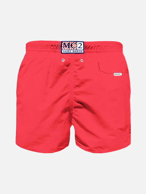 Boy fluo red swim shorts | PANTONE™ SPECIAL EDITION