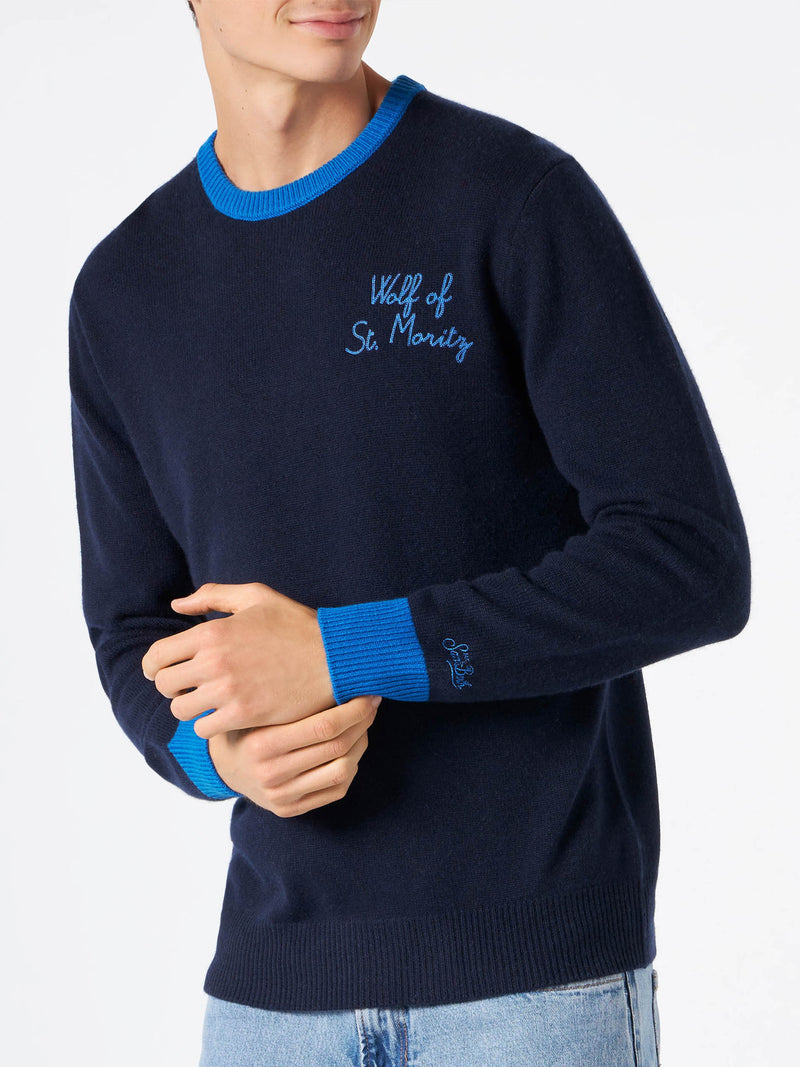 Marineblauer Herrenpullover mit „Wolf von St. Moritz“-Stickerei