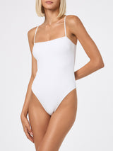 Woman white ribbed one piece swimsuit