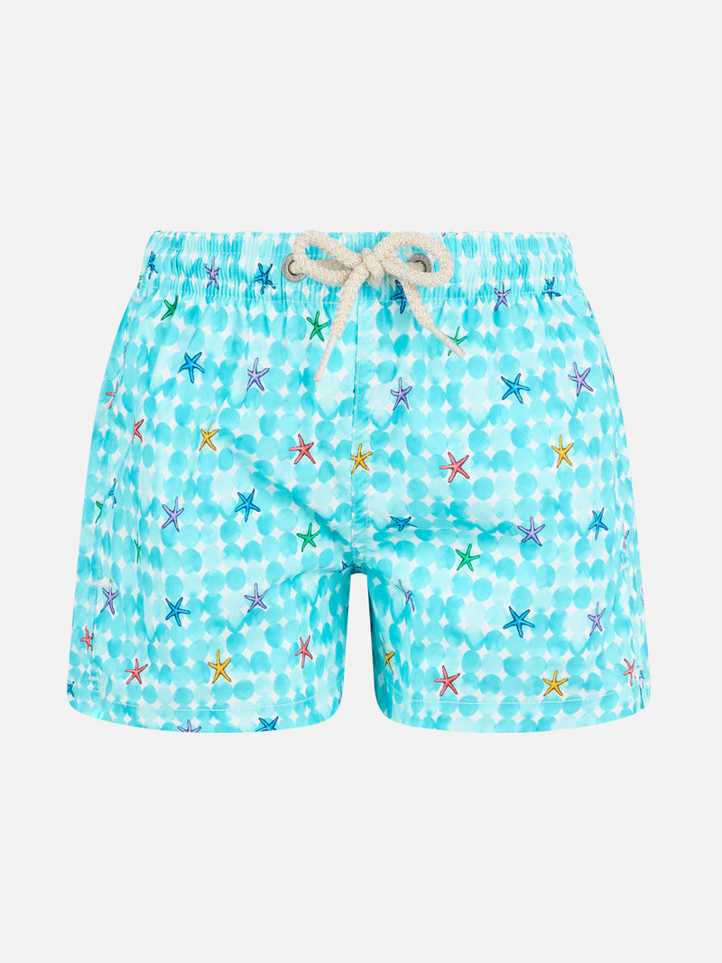 Costume da bagno da bambino azzurro con stampa stelle marine e tessuto comfort