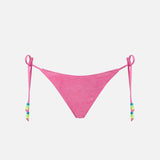 Woman pink terry swim briefs with side laces