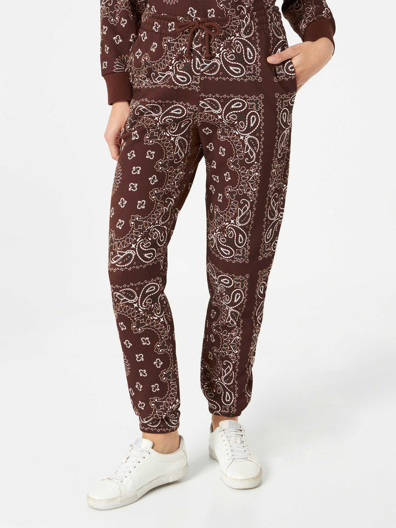 Woman fleece pants with brown bandanna print