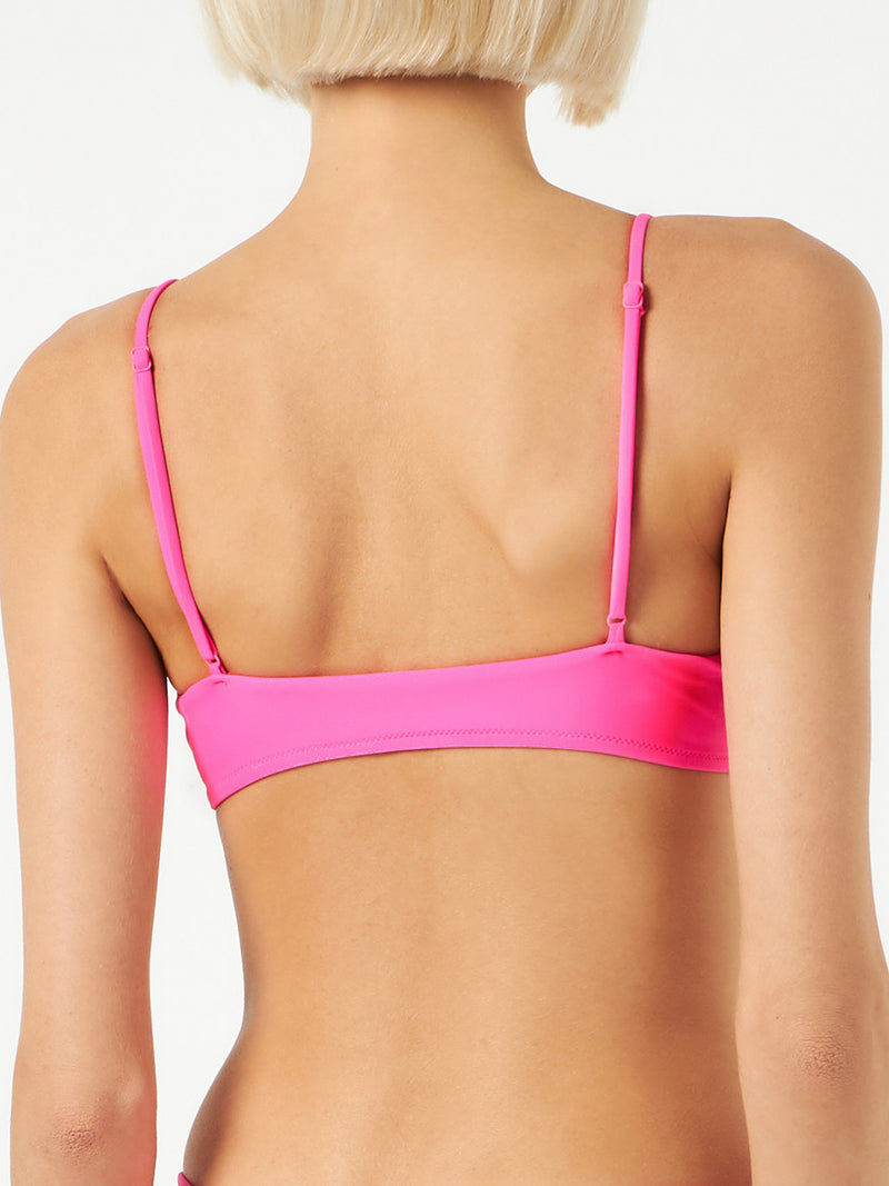 Woman fluo pink bralette swimsuit