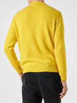 Man yellow sweater with Life's two shots lettering