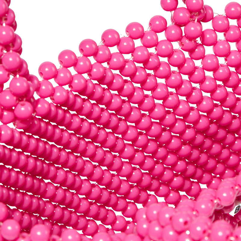 Beaded pink handbag with green heart