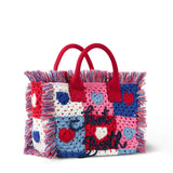 Colette handbag with crochet heart patches