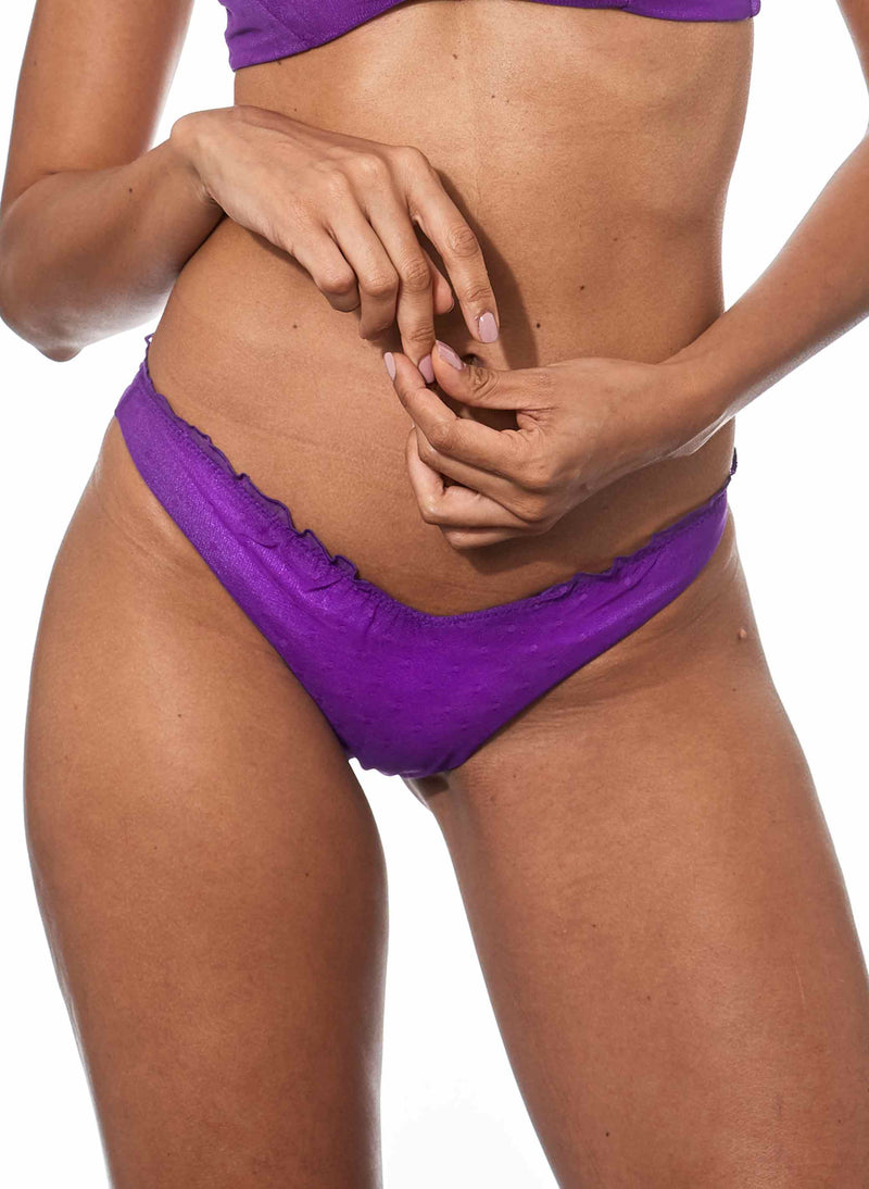 Woman purple cheeky swim briefs