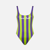 Woman lime and purple one piece swimsuit